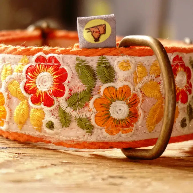 Individual Orange Necklace with Floral Design.