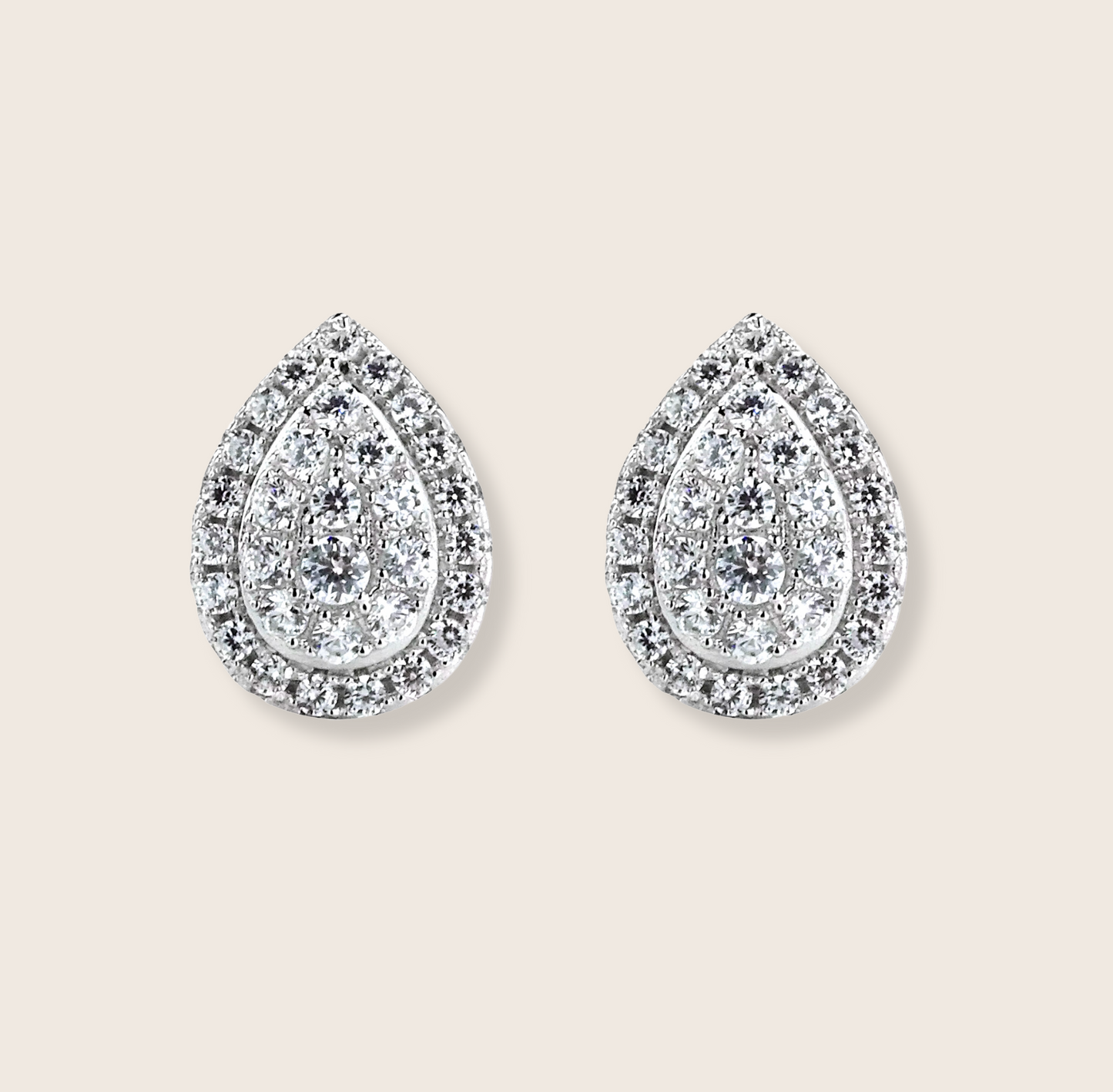 The Irina Pear Cut Halo Earrings